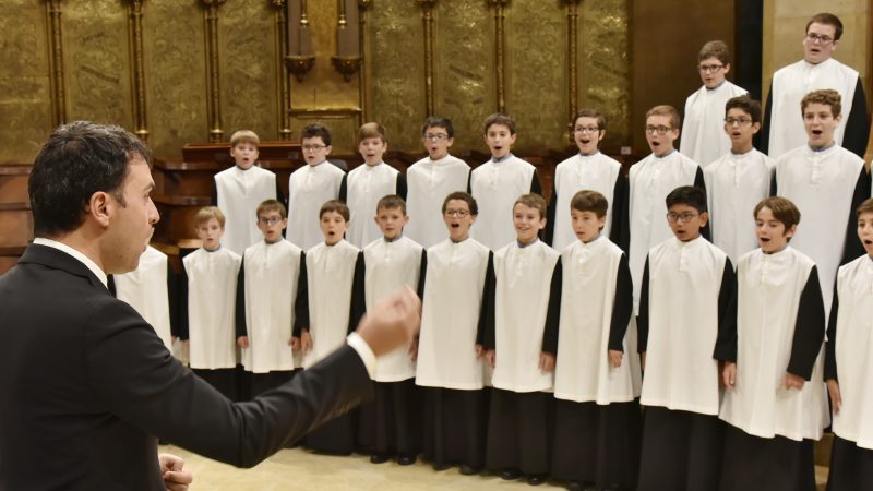 Montserrat Boy Choir singing with conductor 1, Photo Credit: Unknown