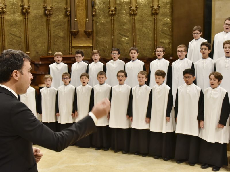 Montserrat Boy Choir singing with conductor 1, Photo Credit: Unknown