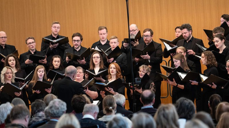 VocalEssence Ensemble Singers wearing black perform. Photo Credit: Bruce Silcox