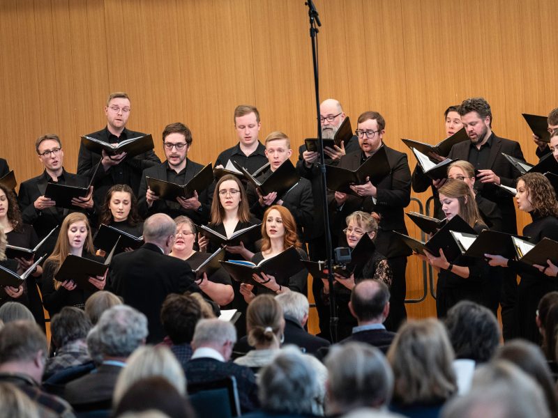 VocalEssence Ensemble Singers wearing black perform. Photo Credit: Bruce Silcox