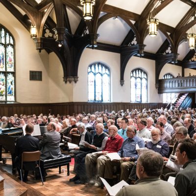 Community members singing the music of Sir John Rutter conducted by the composer himself. Photo credit: Bruce Silcox